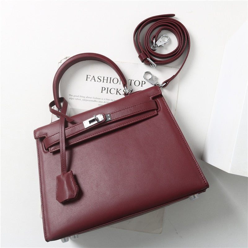 Womens Swift Leather Padlock Top Handle Cross Body Bag