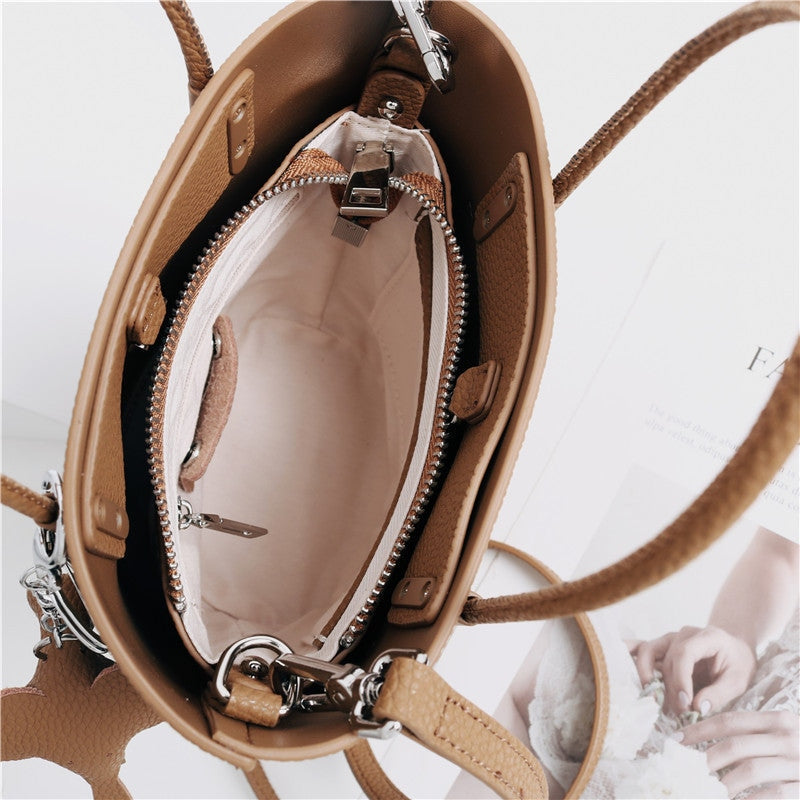 Small Bucket Bag In Grainy Calfskin Leather With Elephant Hanger
