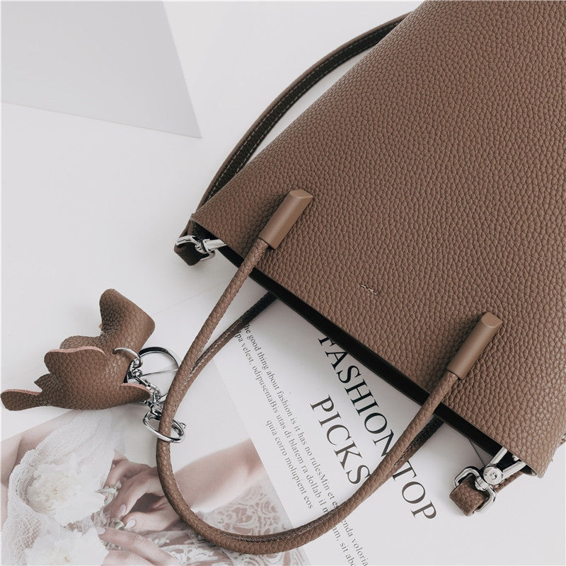 Small Bucket Bag In Grainy Calfskin Leather With Elephant Hanger