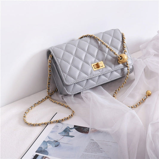Women’s Mini Quilted Leather Shoulder Cross Body Clutch Bag With Ball Chain