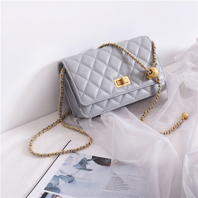 Women’s Mini Quilted Leather Shoulder Cross Body Clutch Bag With Ball Chain